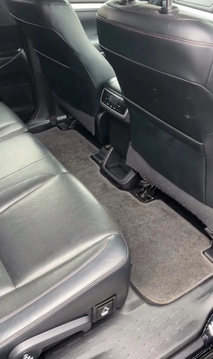 Clean rear seats and carpet in the same Toyota Highlander after Bay's interior detail